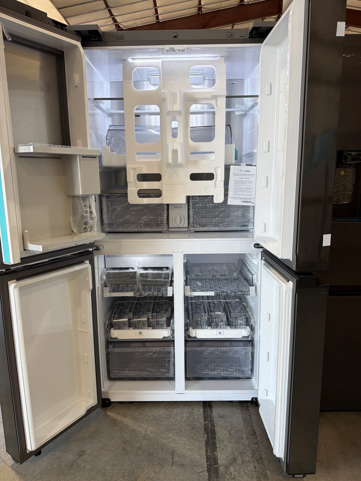 T8ID18 - Samsung RF23DB9900QD/AA Bespoke 4-Door Flex Refrigerator