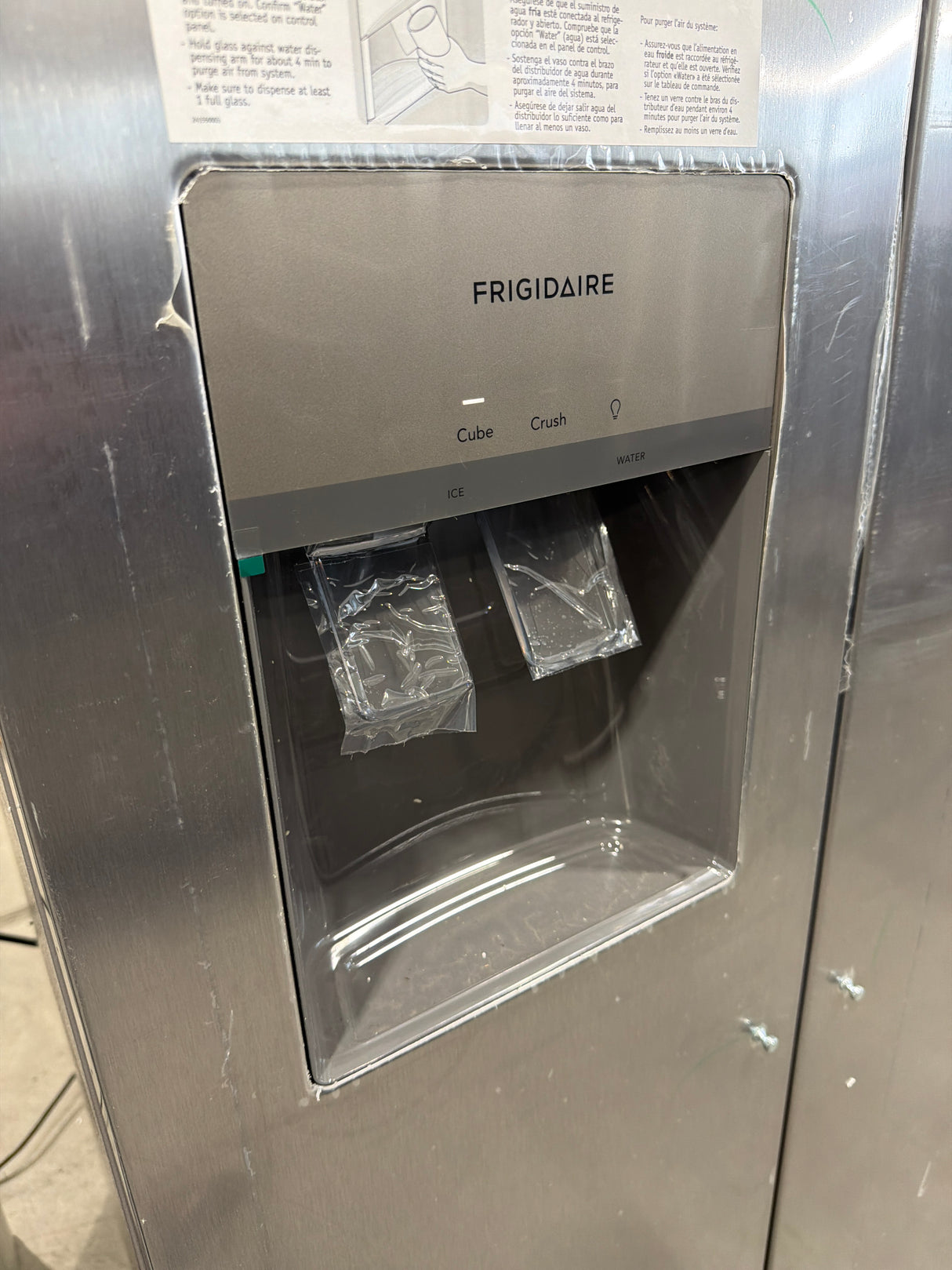 T9ID40 - Frigidaire FRSS2623AS Side-by-Side Refrigerator