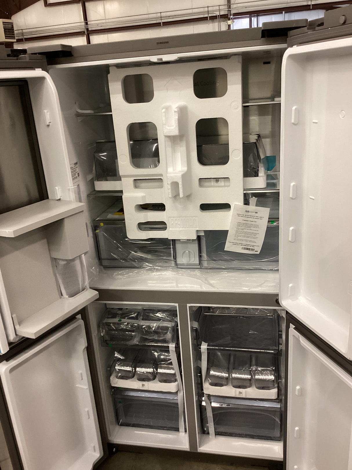 T1ID30 23 cu. ft. Smart Counter Depth 4-Door Flex™ refrigerator with Family Hub™ and Beverage Center in Stainless Steel RF23A9771SR/AA