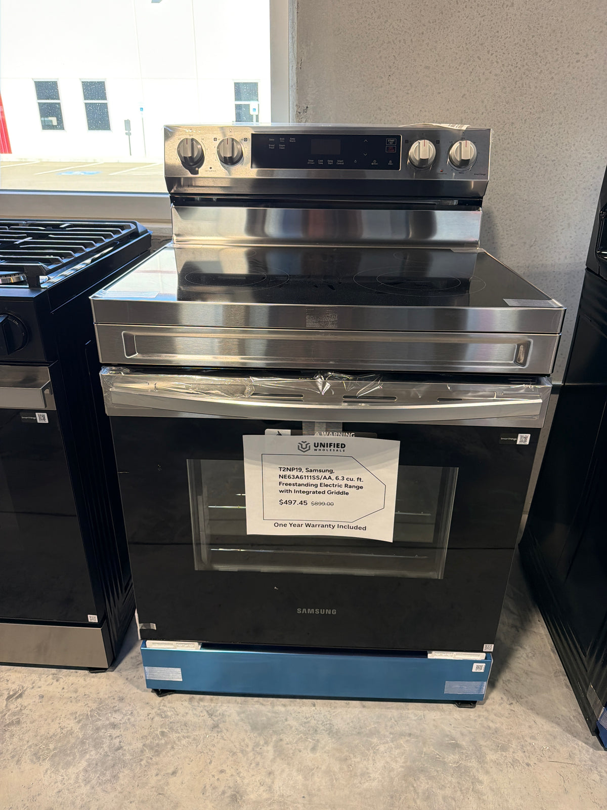 Samsung 6.3 cu ft Freestanding Electric Range with Griddle NE63A6111SS/AA – T2NP19