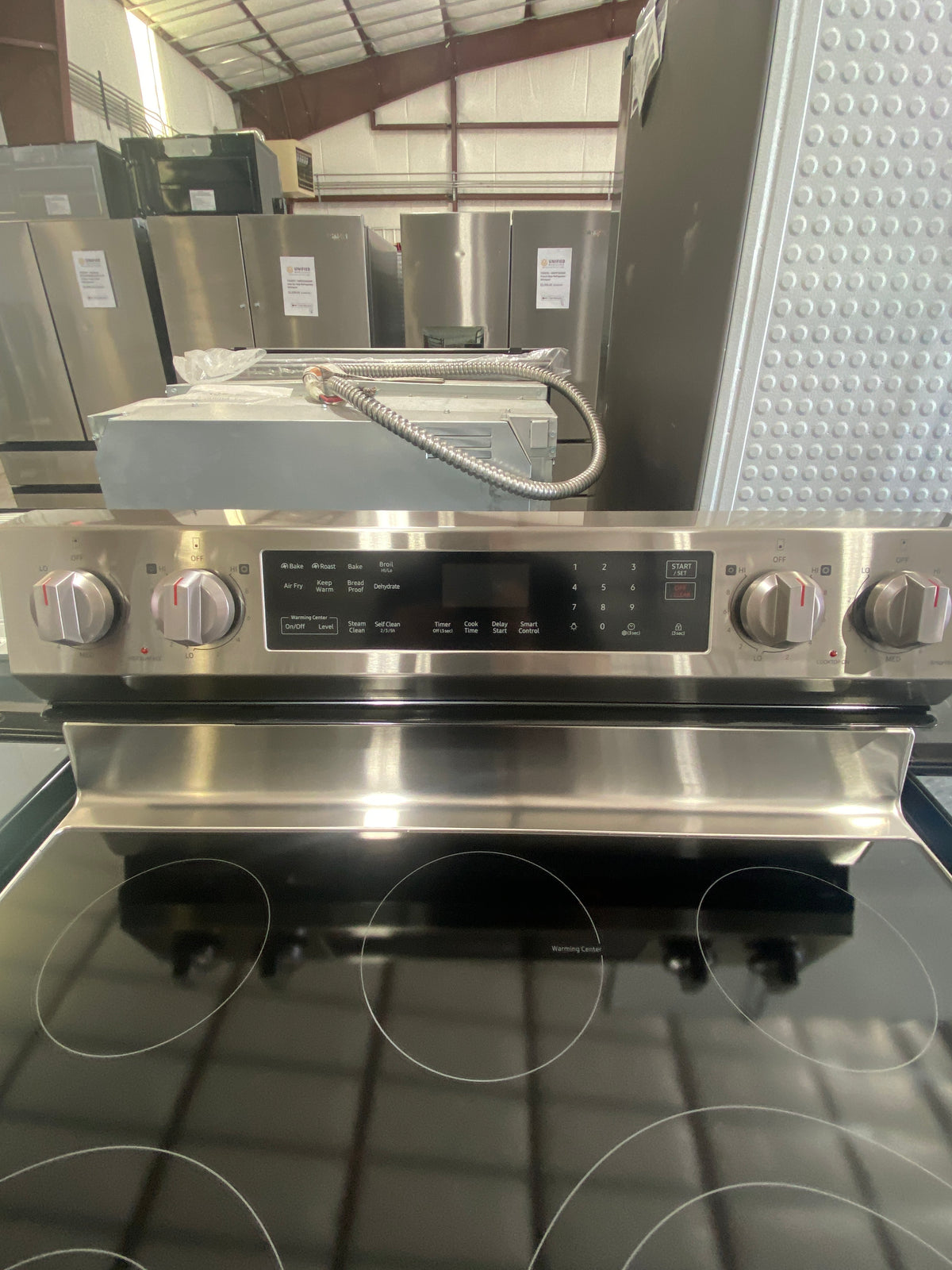 T13ID22 – NE63A6511SS/AA 6.3 Cu. Ft. Smart Electric Range – Samsung
