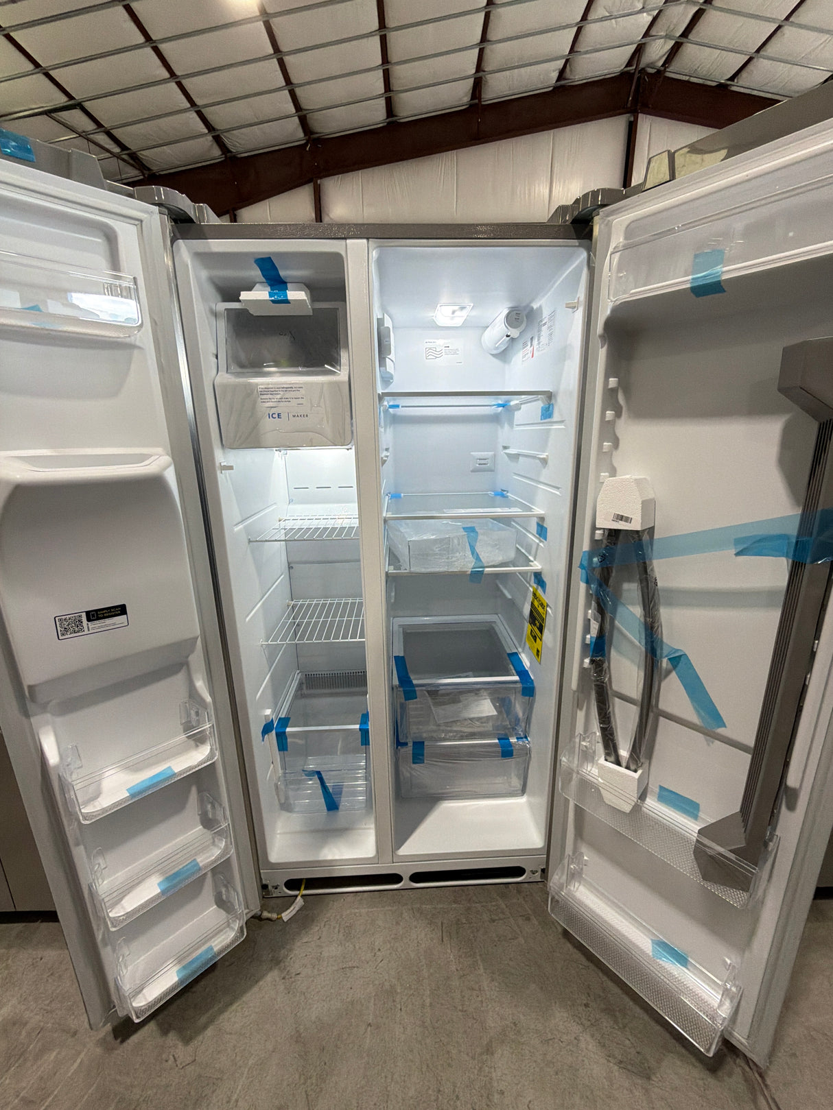 T9ID42 - Frigidaire FRSS2623AS Side-by-Side Refrigerator