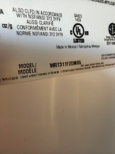 Whirlpool 20.5 cu ft Top Freezer Refrigerator WRT311FZDM - scratch and dent, Nampa ID (photo 4)