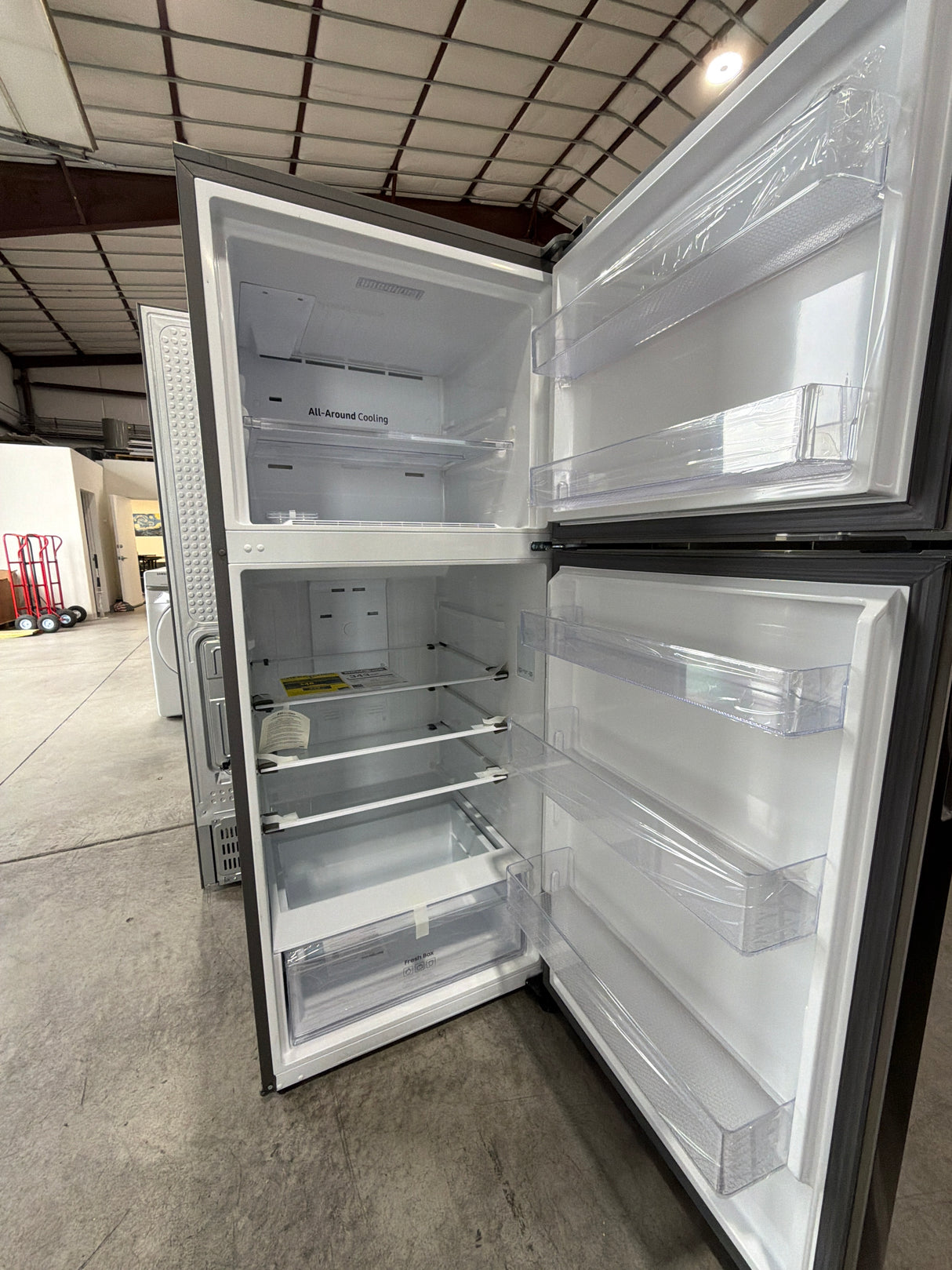 T12ID12 - Samsung RT70F18LRSRAA 17.5 cu. ft. Garage Ready Top Freezer Refrigerator
