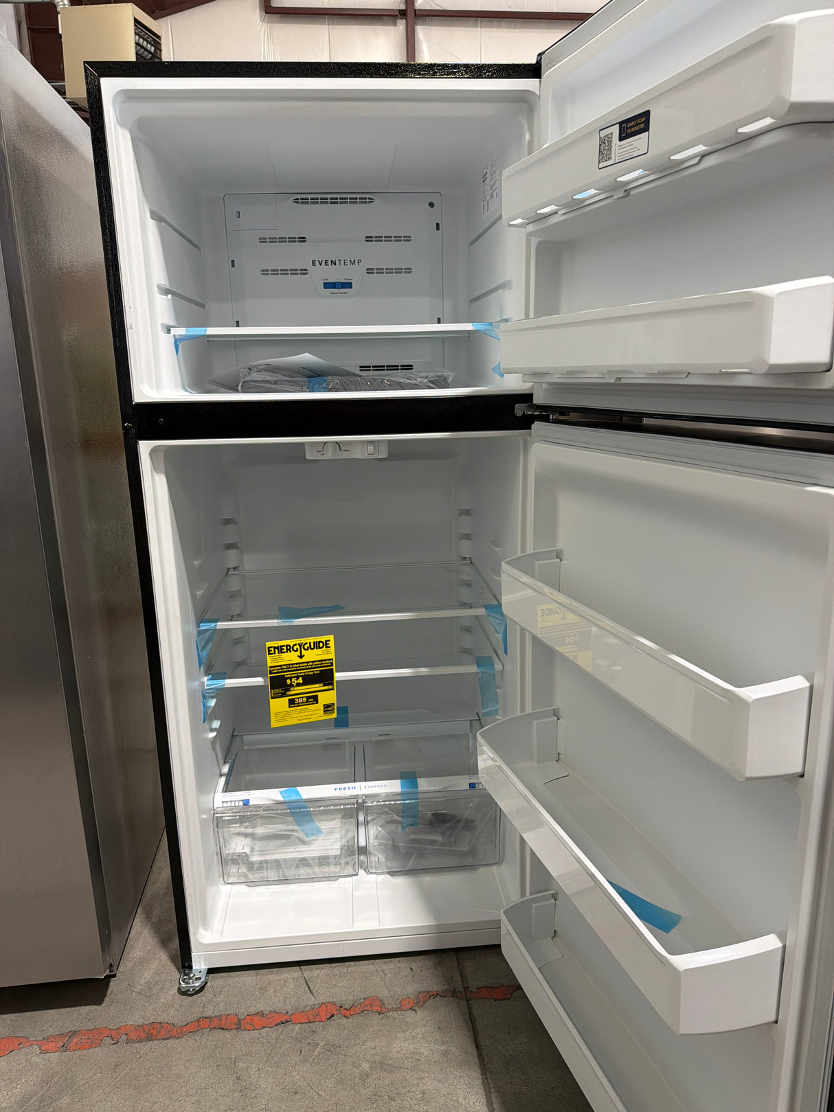 T9ID14 - Frigidaire FFHT2022AB Top Freezer Refrigerator