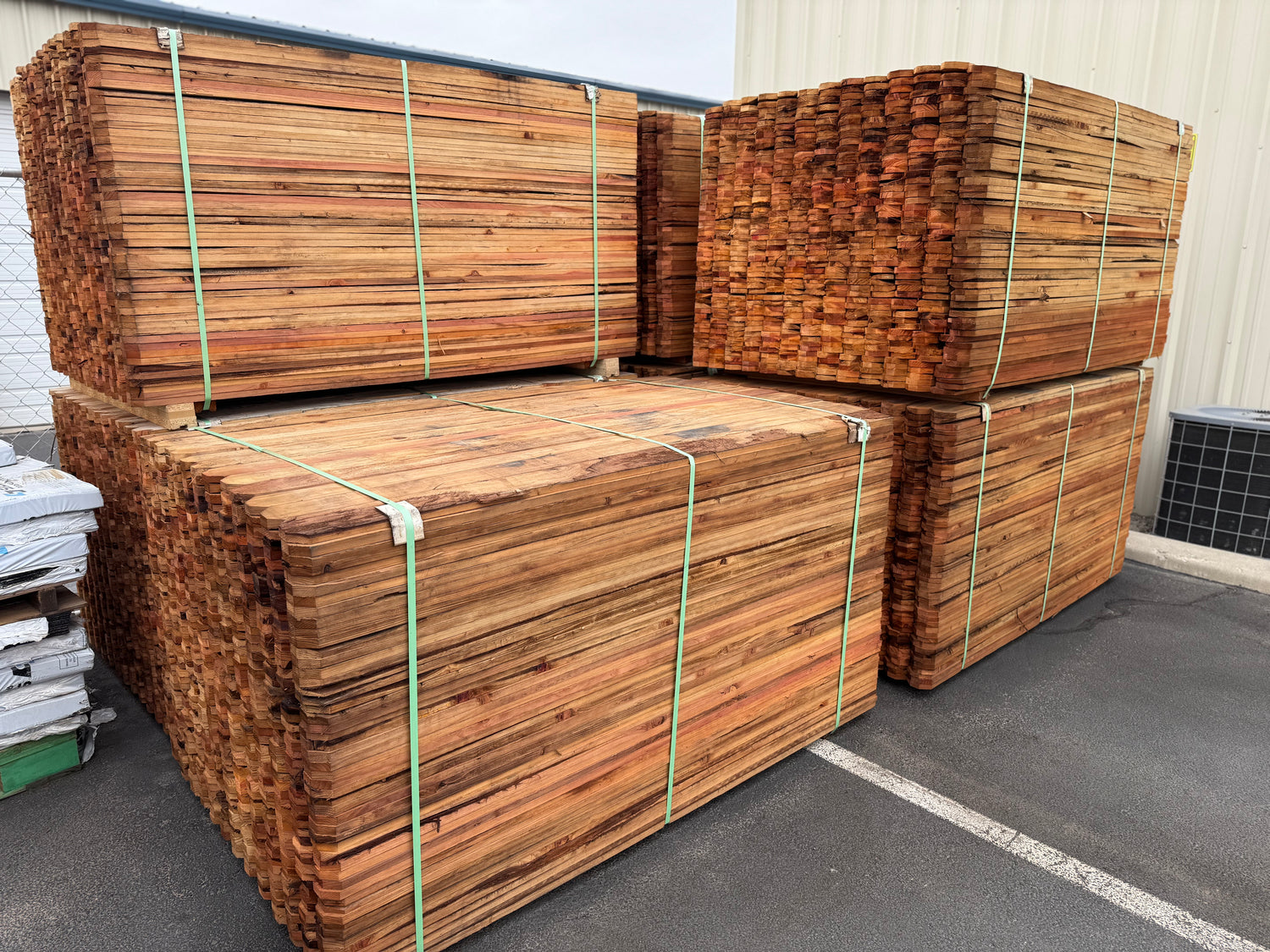 7 Full bundles of dog-ear redwood fence pickets