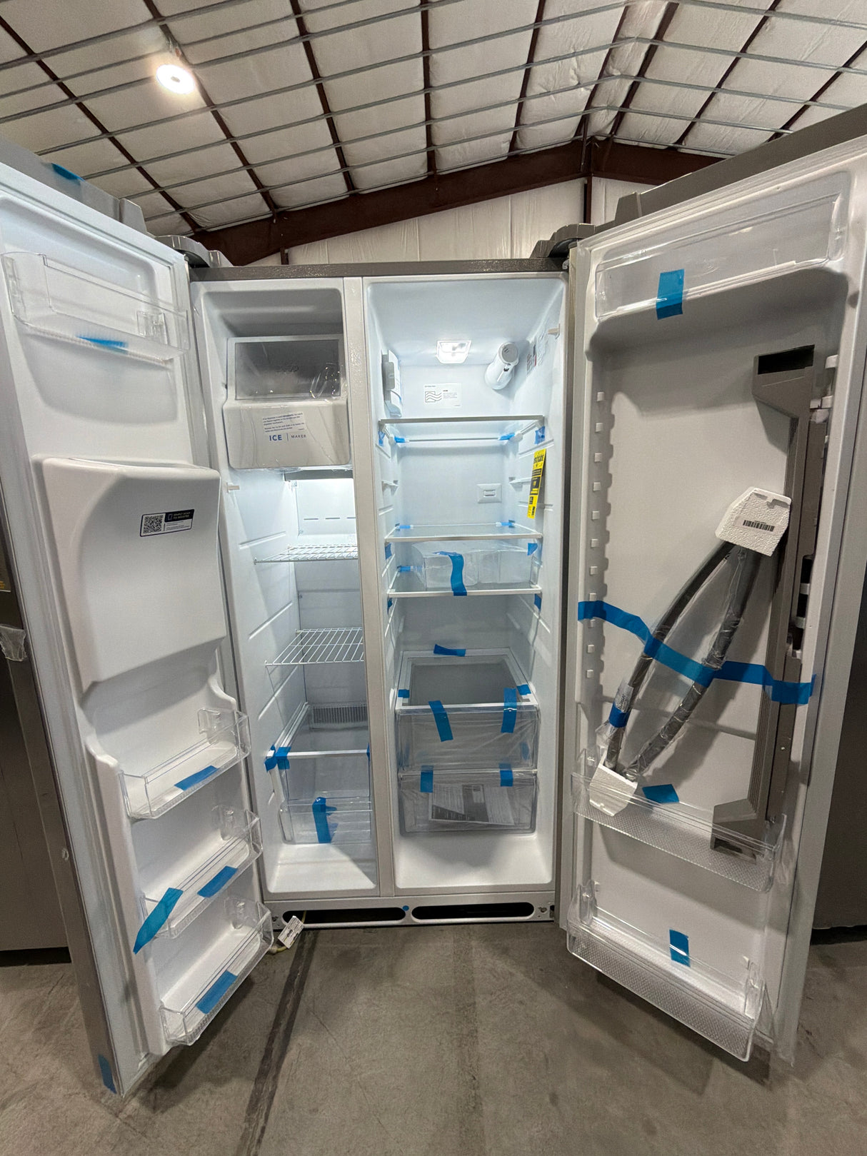 T9ID40 - Frigidaire FRSS2623AS Side-by-Side Refrigerator